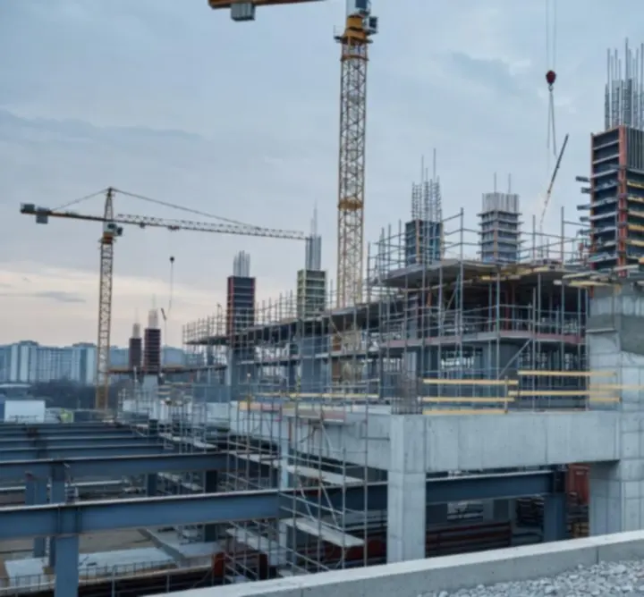 Engineer inspecting a construction site with a focus on safety and compliance